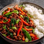Spicy Ground Beef Stir-Fry Bowl with Garlic Veggies & Steamy Rice First Image